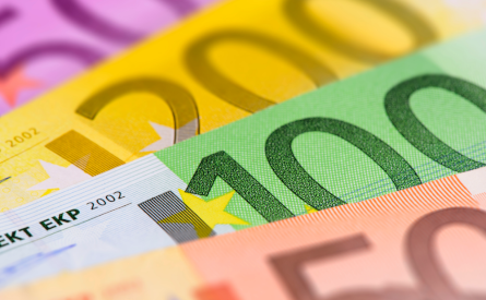Photo of Euro banknotes fanned out.